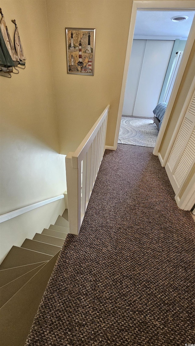 5 Gate 1 Unit 5, Calabash, NC 28467 - corridor featuring carpet and an upstairs landing