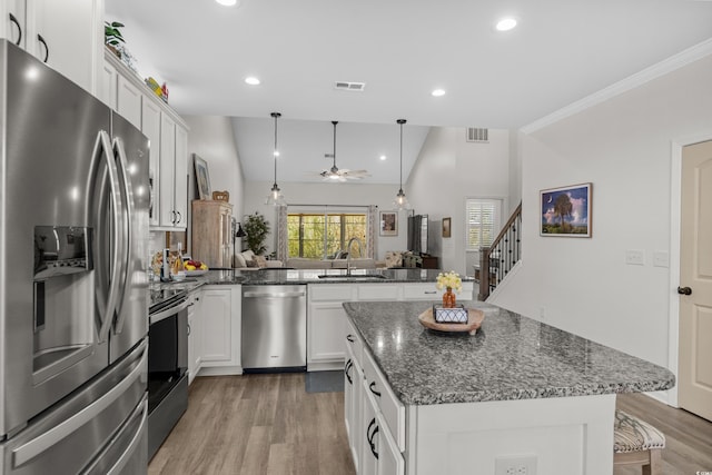 212 Machrie Loop Unit D, Myrtle Beach, SC 29588 - kitchen featuring a sink, visible vents, appliances with stainless steel finishes, and a peninsula