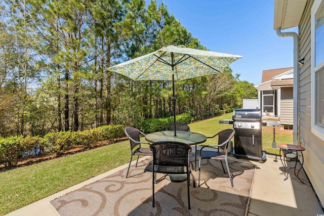 212 Machrie Loop Unit D, Myrtle Beach, SC 29588 - view of patio with area for grilling and outdoor dining area