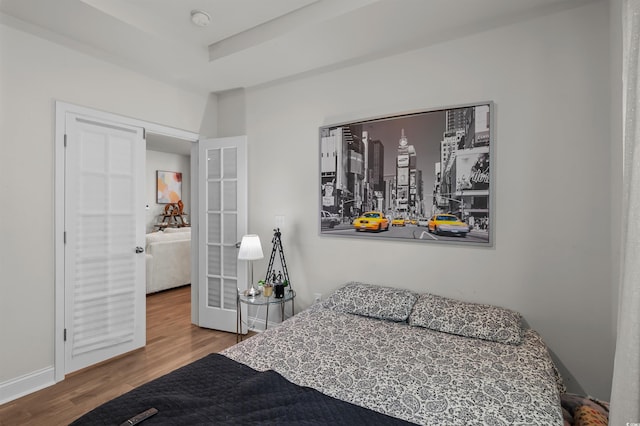 1176 Harbison Cir, Myrtle Beach, SC 29579 - bedroom with wood finished floors, french doors, and baseboards