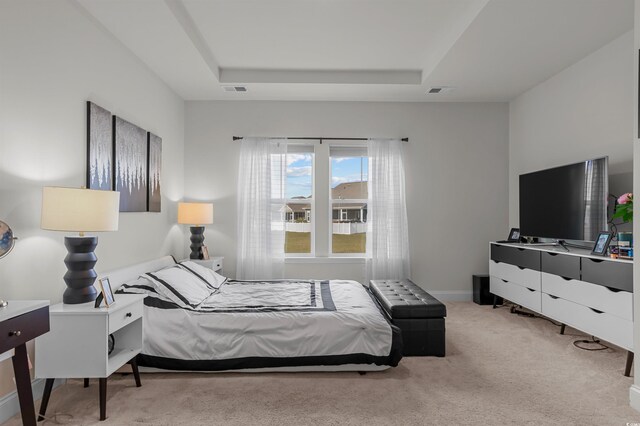1176 Harbison Cir, Myrtle Beach, SC 29579 - carpeted bedroom featuring a raised ceiling and baseboards