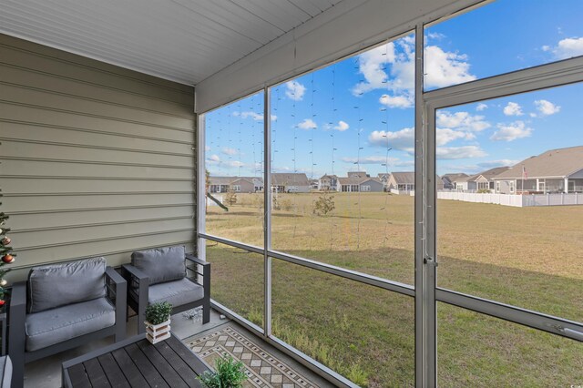 1176 Harbison Cir, Myrtle Beach, SC 29579 - unfurnished sunroom with a residential view
