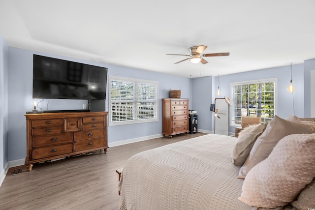 160 Shipmaster Ave, Pawleys Island, SC 29585 - bedroom featuring wood finished floors, baseboards, and a ceiling fan