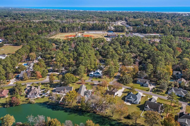 160 Shipmaster Ave, Pawleys Island, SC 29585 - view of property location featuring a heavily wooded area, a nearby body of water, and nearby suburban area