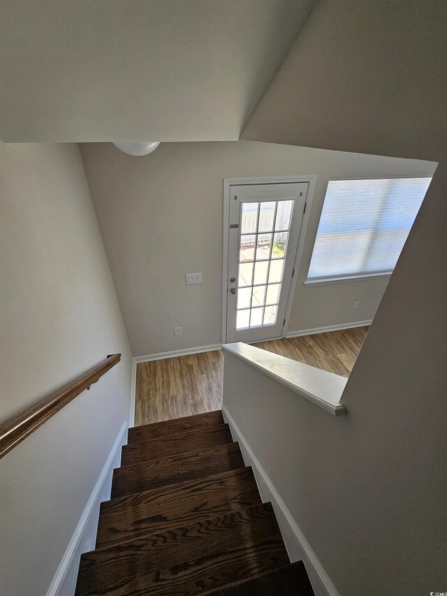 703 S 1st Ave S Unit 34D, North Myrtle Beach, SC 29582 - stairs featuring wood finished floors and baseboards