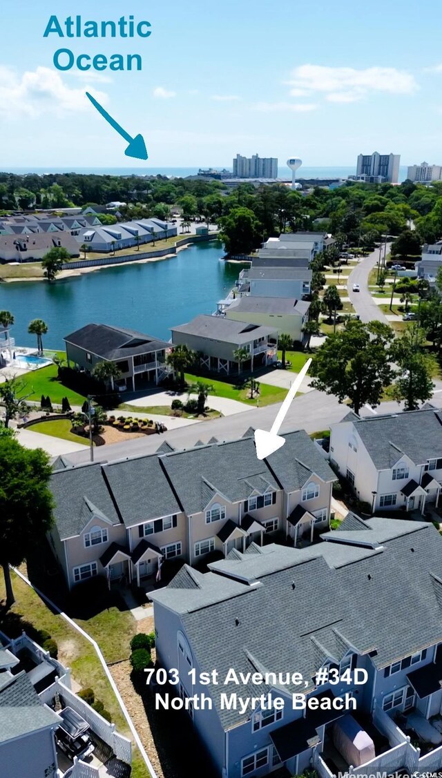 703 S 1st Ave S Unit 34D, North Myrtle Beach, SC 29582 - dock with a water view and a wooded view