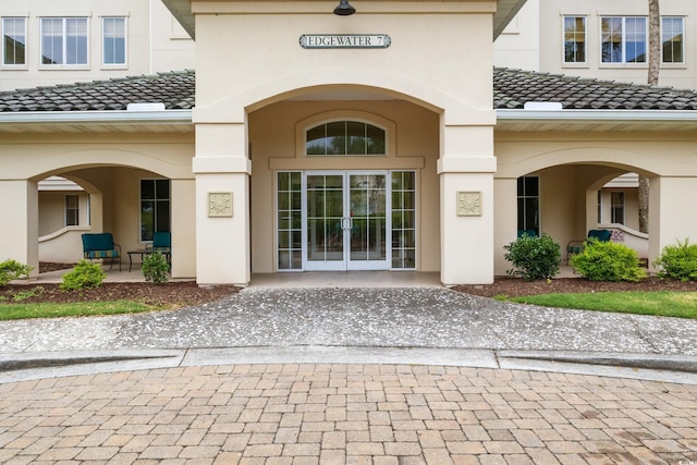 2180 Waterview Dr Unit 733, North Myrtle Beach, SC 29582 - view of exterior entry featuring stucco siding and a tile roof