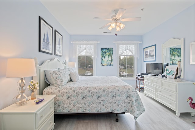 2180 Waterview Dr Unit 733, North Myrtle Beach, SC 29582 - bedroom featuring light wood-style flooring and ceiling fan