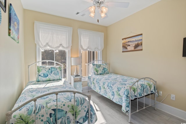 2180 Waterview Dr Unit 733, North Myrtle Beach, SC 29582 - bedroom with wood finished floors, baseboards, and a ceiling fan