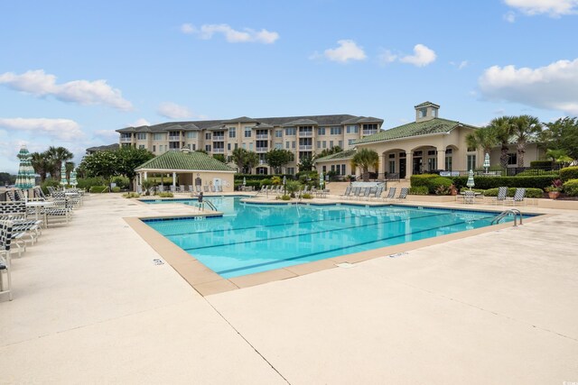 2180 Waterview Dr Unit 733, North Myrtle Beach, SC 29582 - community pool featuring a patio area and fence