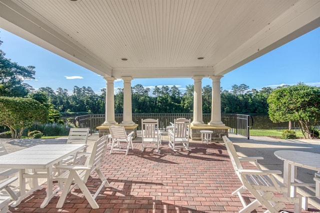 view of patio / terrace featuring outdoor dining space and fence