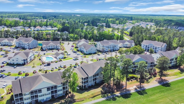birds eye view of property with a residential view