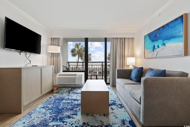 3000 N Ocean Blvd Unit 130, Myrtle Beach, SC 29577 - living room featuring ornamental molding, light wood finished floors, and an AC wall unit