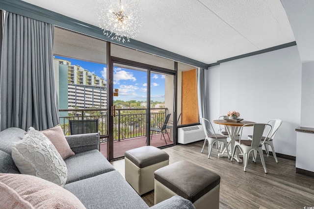 6900 N Ocean Blvd Unit 404, Myrtle Beach, SC 29572 - living area featuring wood finished floors, a wall of windows, baseboards, a notable chandelier, and a textured ceiling