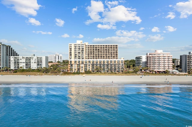 6900 N Ocean Blvd Unit 404, Myrtle Beach, SC 29572 - view of pool featuring a view of the beach, a city view, and a water view