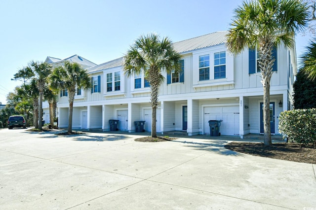 4850 Cantor Ct Unit 202, North Myrtle Beach, SC 29582 - multi unit property featuring board and batten siding, concrete driveway, and a garage