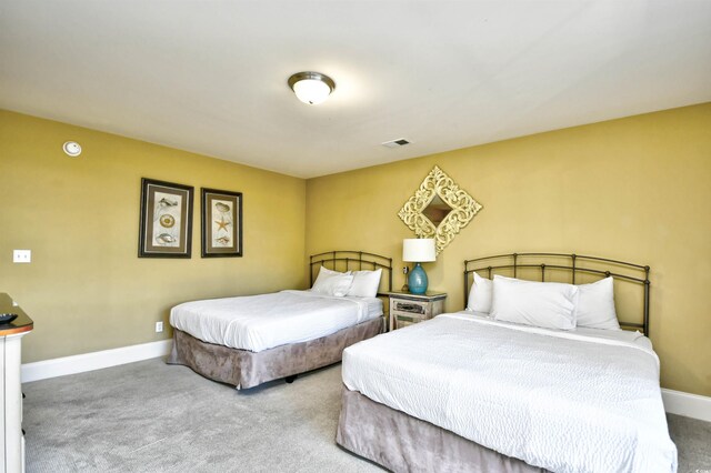 4850 Cantor Ct Unit 202, North Myrtle Beach, SC 29582 - carpeted bedroom featuring baseboards