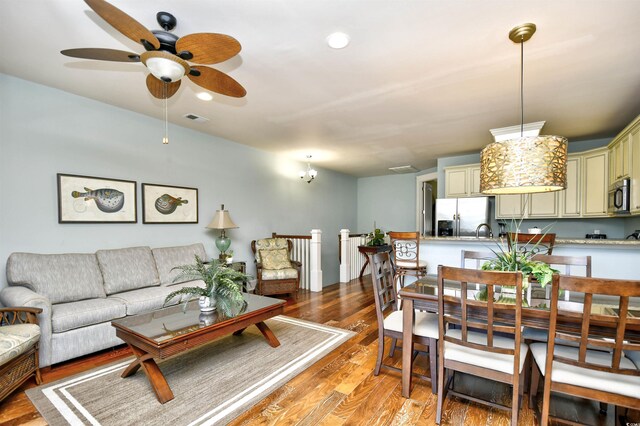 4850 Cantor Ct Unit 202, North Myrtle Beach, SC 29582 - living area with light wood-style floors, a ceiling fan, and recessed lighting