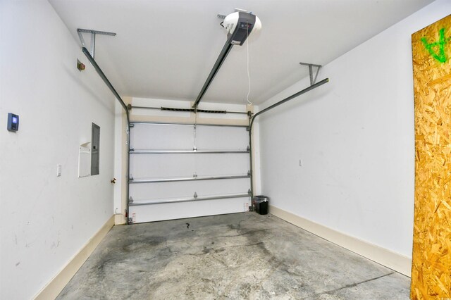 4850 Cantor Ct Unit 202, North Myrtle Beach, SC 29582 - garage featuring baseboards and electric panel