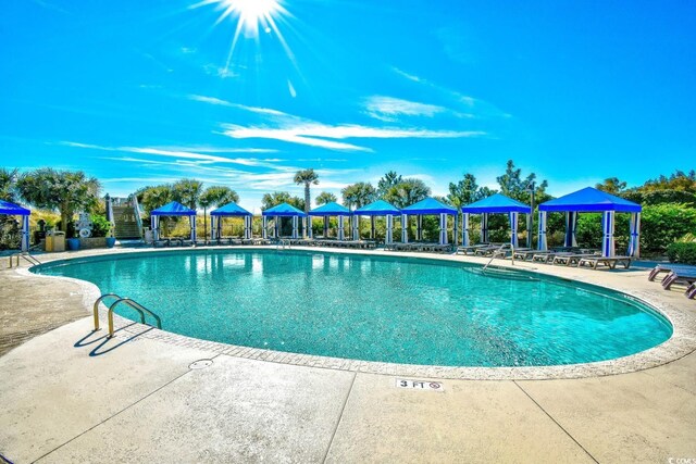 4850 Cantor Ct Unit 202, North Myrtle Beach, SC 29582 - community pool featuring a gazebo and a patio area