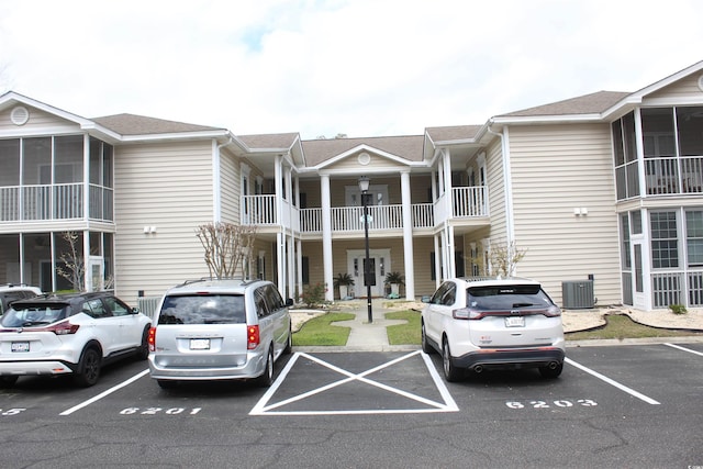 6204 Sweetwater Blvd Unit 6204, Murrells Inlet, SC 29576 - view of property with central AC unit and uncovered parking