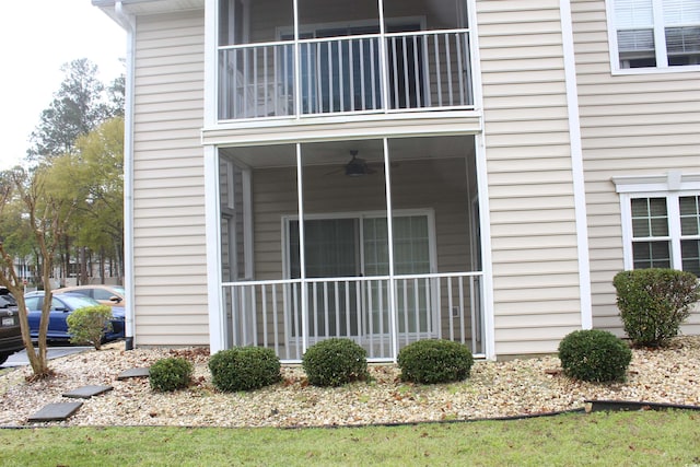 6204 Sweetwater Blvd Unit 6204, Murrells Inlet, SC 29576 - view of side of home featuring a ceiling fan and a balcony