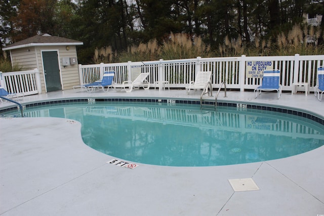 6204 Sweetwater Blvd Unit 6204, Murrells Inlet, SC 29576 - community pool featuring an outdoor structure and a patio area
