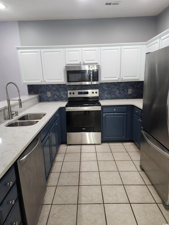 6204 Sweetwater Blvd Unit 6204, Murrells Inlet, SC 29576 - kitchen with a sink, white cabinetry, stainless steel appliances, and blue cabinetry