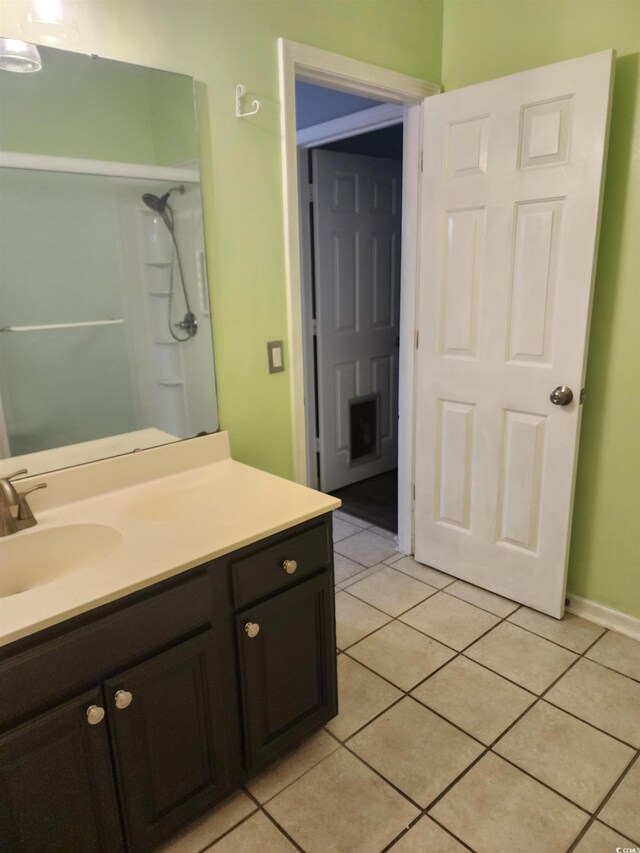 6204 Sweetwater Blvd Unit 6204, Murrells Inlet, SC 29576 - bathroom featuring tile patterned floors, vanity, and baseboards