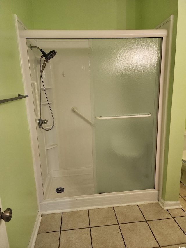 6204 Sweetwater Blvd Unit 6204, Murrells Inlet, SC 29576 - bathroom featuring tile patterned floors, a stall shower, and baseboards