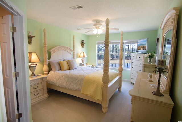 5030 Windsor Green Way Unit 203, Myrtle Beach, SC 29579 - bedroom with light colored carpet, visible vents, and ceiling fan