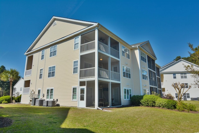 5030 Windsor Green Way Unit 203, Myrtle Beach, SC 29579 - back of house with a yard and central air condition unit