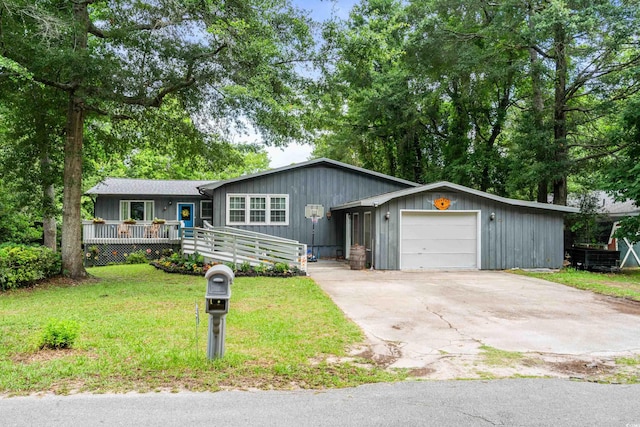 532 Medcalf Dr SW, Sunset Beach, NC 28468 - ranch-style home with driveway, a front yard, and an attached garage