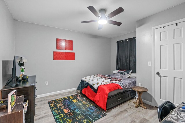 532 Medcalf Dr SW, Sunset Beach, NC 28468 - bedroom with baseboards, wood finished floors, and ceiling fan