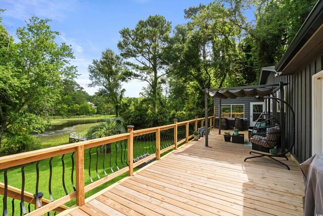 532 Medcalf Dr SW, Sunset Beach, NC 28468 - wooden deck featuring a yard