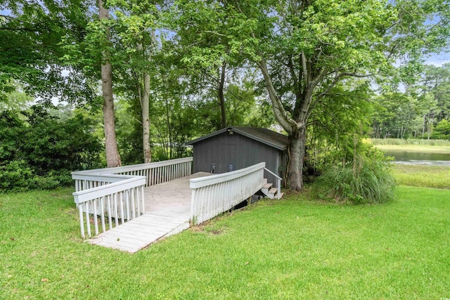 532 Medcalf Dr SW, Sunset Beach, NC 28468 - view of yard featuring a wooden deck