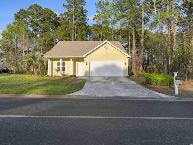 4533 Greenbriar Dr, Little River, SC 29566 - ranch-style house with an attached garage, concrete driveway, and a front lawn