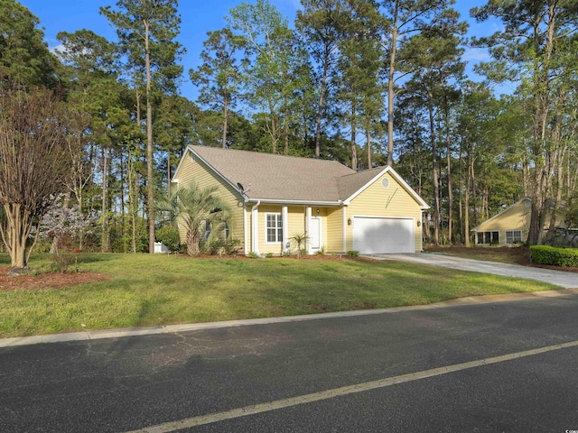 4533 Greenbriar Dr, Little River, SC 29566 - view of front facade with a shingled roof, a garage, a front yard, and concrete driveway