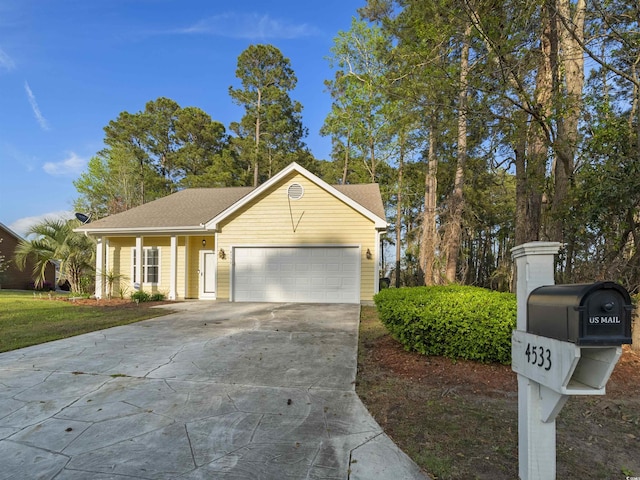 4533 Greenbriar Dr, Little River, SC 29566 - ranch-style house featuring concrete driveway, a garage, and a front yard