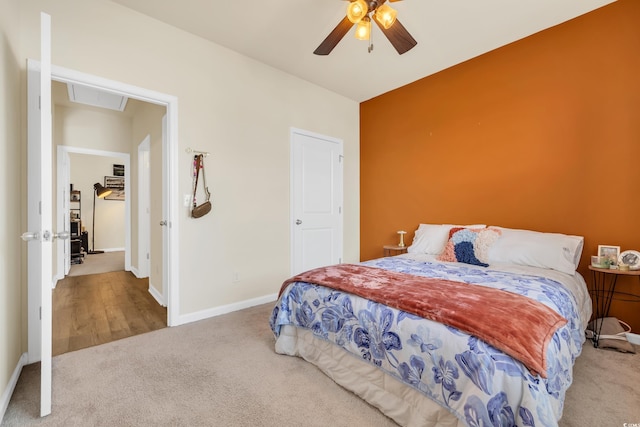 bedroom with carpet floors, baseboards, and ceiling fan