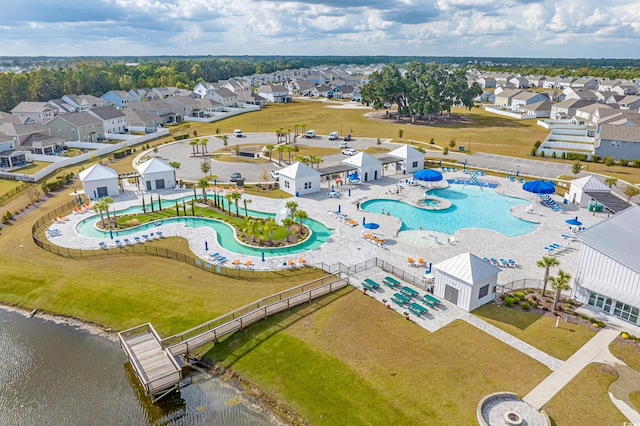 aerial view of residential area featuring a pool area