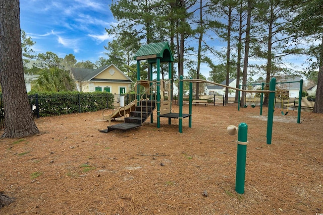 community jungle gym with fence