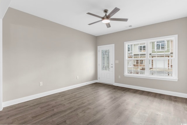 904 62nd Ave N Unit E, Myrtle Beach, SC 29572 - unfurnished room with baseboards, dark wood finished floors, and ceiling fan