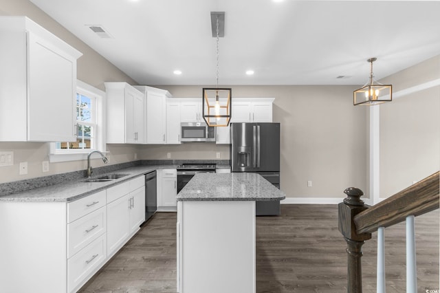 904 62nd Ave N Unit E, Myrtle Beach, SC 29572 - kitchen featuring appliances with stainless steel finishes, a sink, recessed lighting, a kitchen island, and visible vents