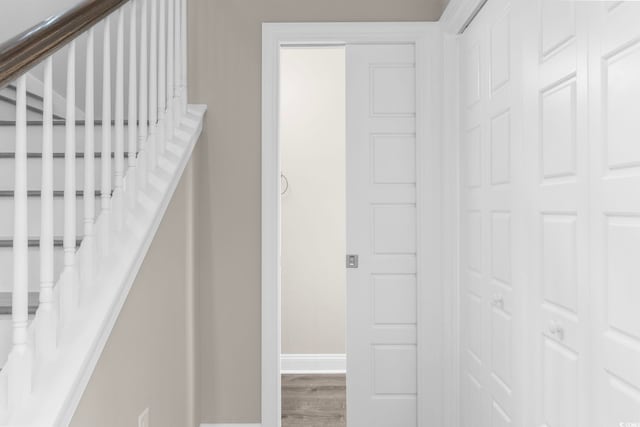 904 62nd Ave N Unit E, Myrtle Beach, SC 29572 - stairway with baseboards and wood finished floors