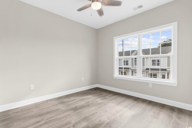 904 62nd Ave N Unit E, Myrtle Beach, SC 29572 - spare room with ceiling fan, baseboards, visible vents, and wood finished floors