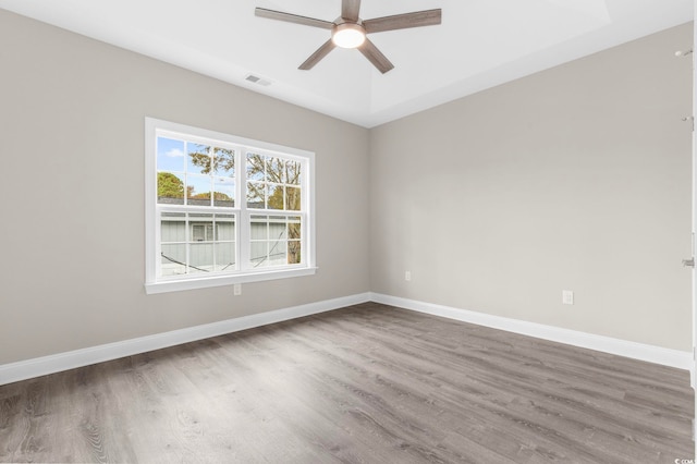 904 62nd Ave N Unit E, Myrtle Beach, SC 29572 - unfurnished room with ceiling fan, wood finished floors, and visible vents
