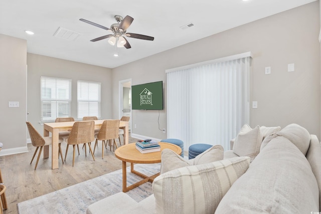 201-E Madison Ct, Myrtle Beach, SC 29577 - living room featuring light wood-style flooring, a ceiling fan, baseboards, and recessed lighting