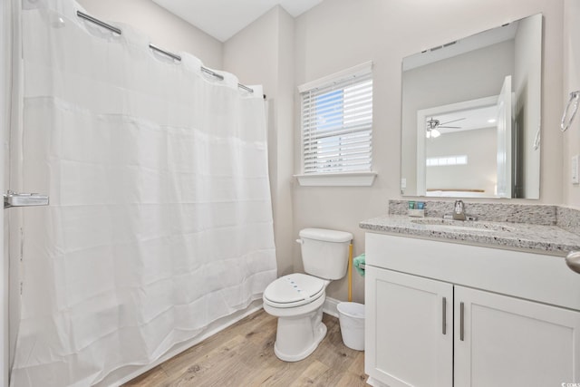 201-E Madison Ct, Myrtle Beach, SC 29577 - full bath with toilet, wood finished floors, vanity, ceiling fan, and a shower with shower curtain