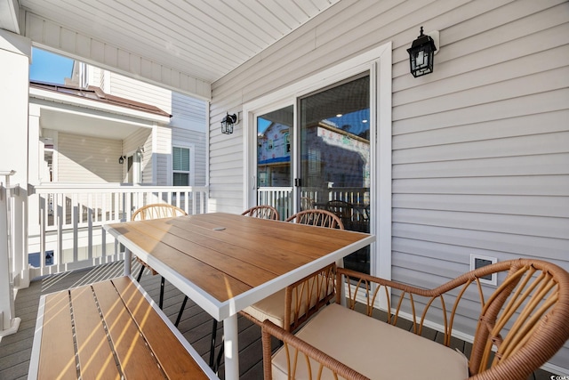 201-E Madison Ct, Myrtle Beach, SC 29577 - sunroom featuring outdoor dining area